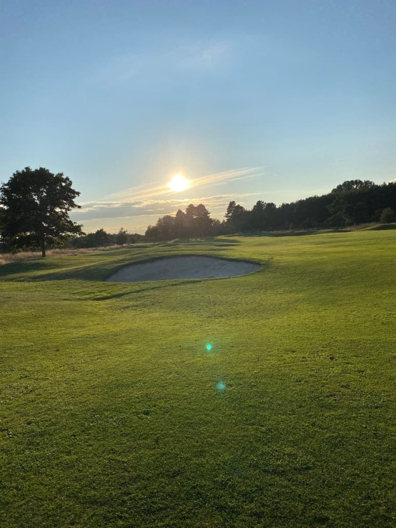 Ystad Golfklubb logotyp